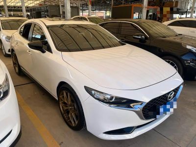 Volkswagen Tiguan L, 2024 г., чёрный, 38 500 км Mazda 马自达3 昂克赛拉, 2023 г., белый, 33 100 км