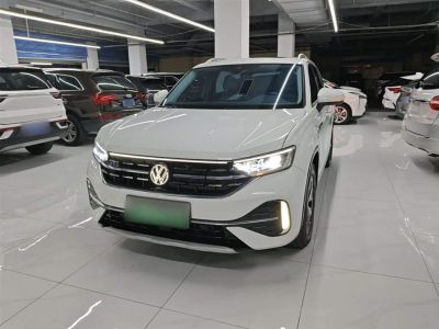 Volkswagen Tayron GTE, 2023 г., белый, 71 900 км Volkswagen Tayron GTE 2023 280TSI комплектация «Люкс Plus», исполнение «Цзиньцзе»