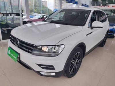 Volkswagen Tiguan L PHEV, 2024 г., белый, 64 000 км Volkswagen Tiguan L 2021 330TSI автомат одна ведущая ось комплектация «Умный комфорт»