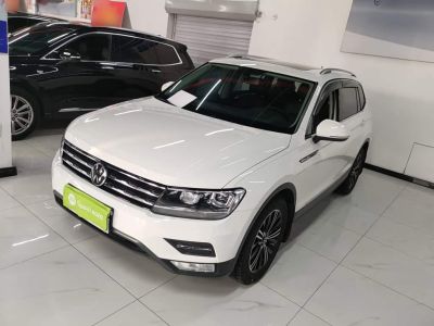 Volkswagen Tiguan L, 2021 г., белый, 58 000 км Volkswagen Tiguan L 2021 330TSI автомат одна ведущая ось комплектация «Умный комфорт»